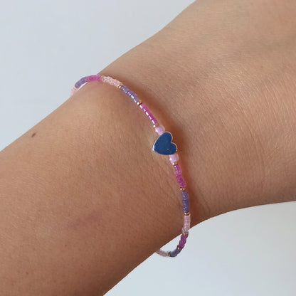 Fijn armbandje met Miyuki kraaltjes en hartje - Paars